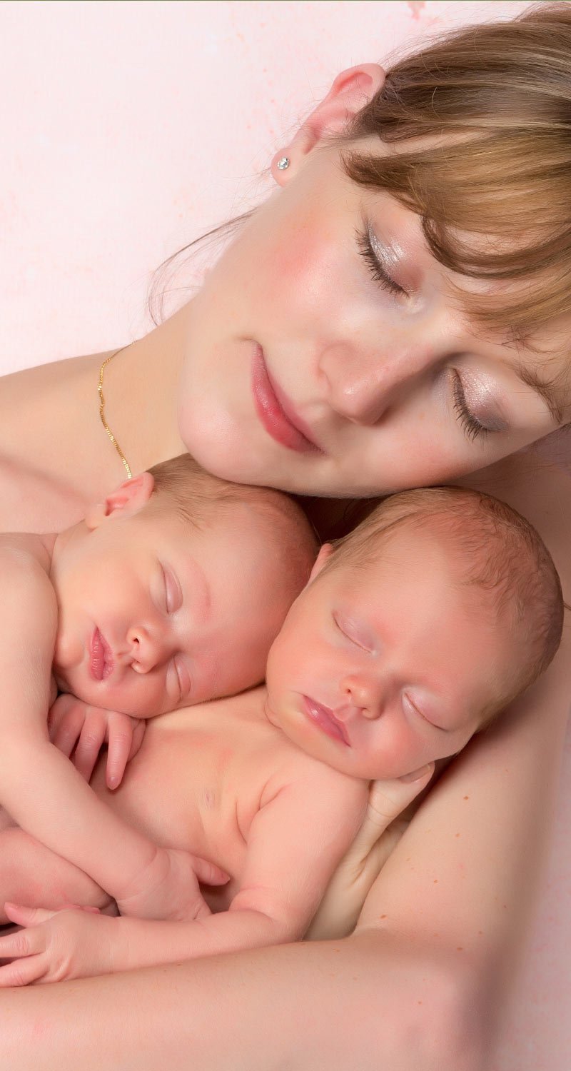 Mother Holding Twins